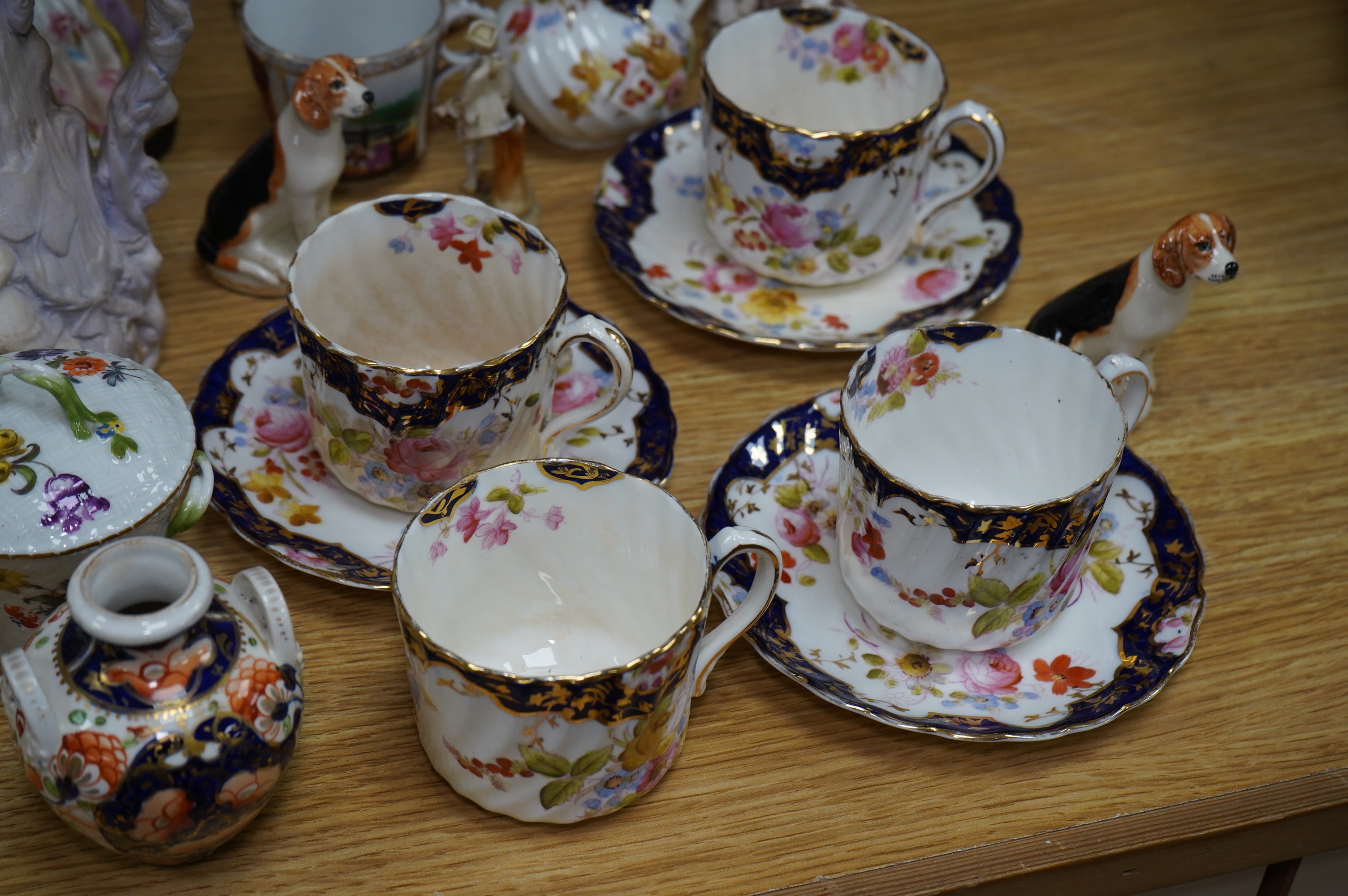 A quantity of 19th and early 20th century ceramics including two chess playing groups, four further Continental figures, a copy of a Meigh teapot, three cups and saucers, two Meissen pots and covers, etc. Condition - var
